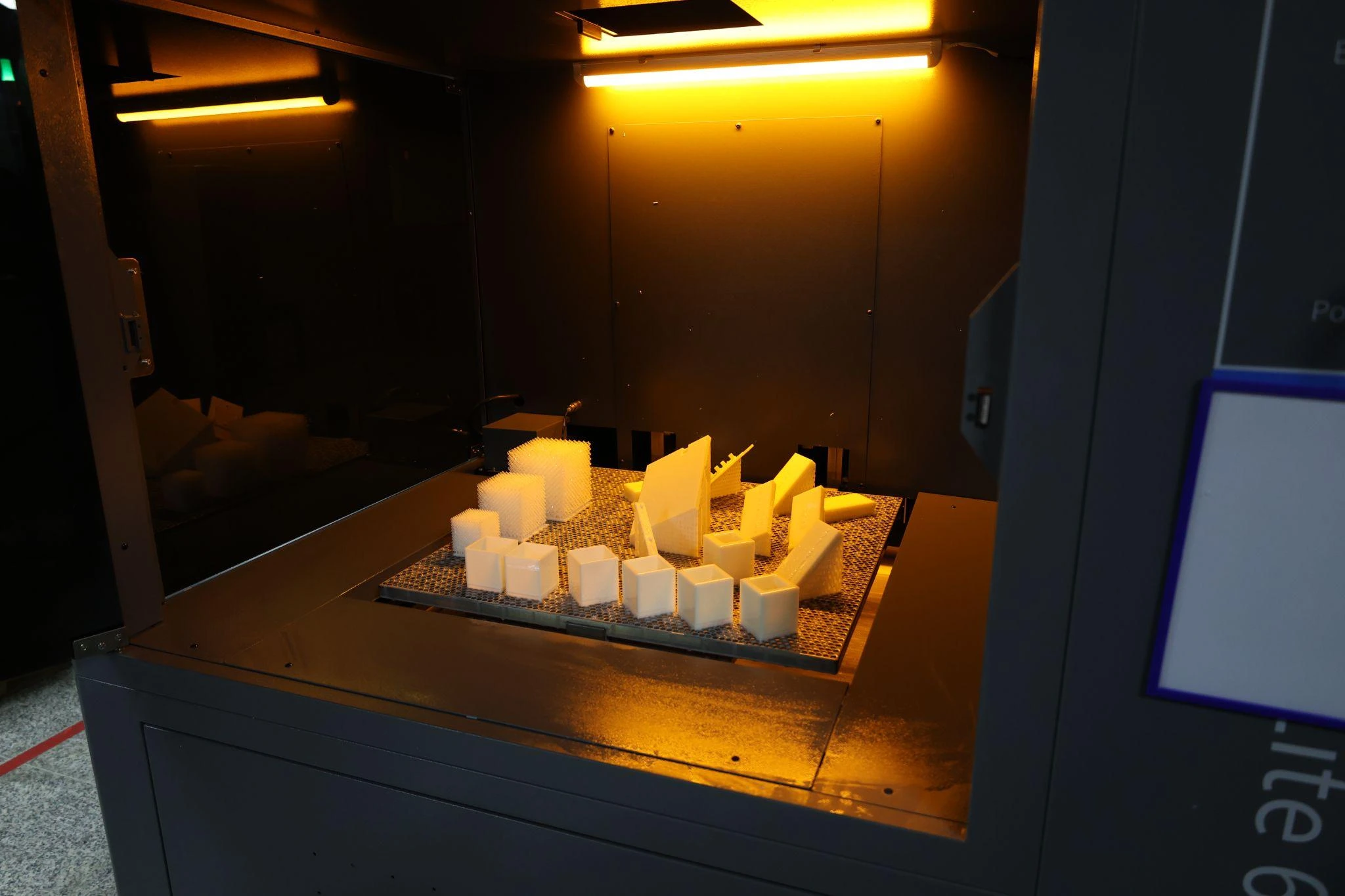 sla 3d printer producing multiple prototype parts