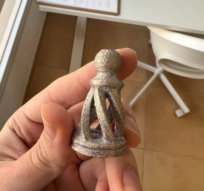 3d printed metal object shaped